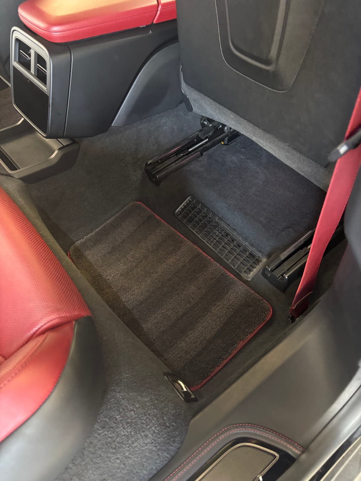 Cleaned floor and pedals of a luxury sedan