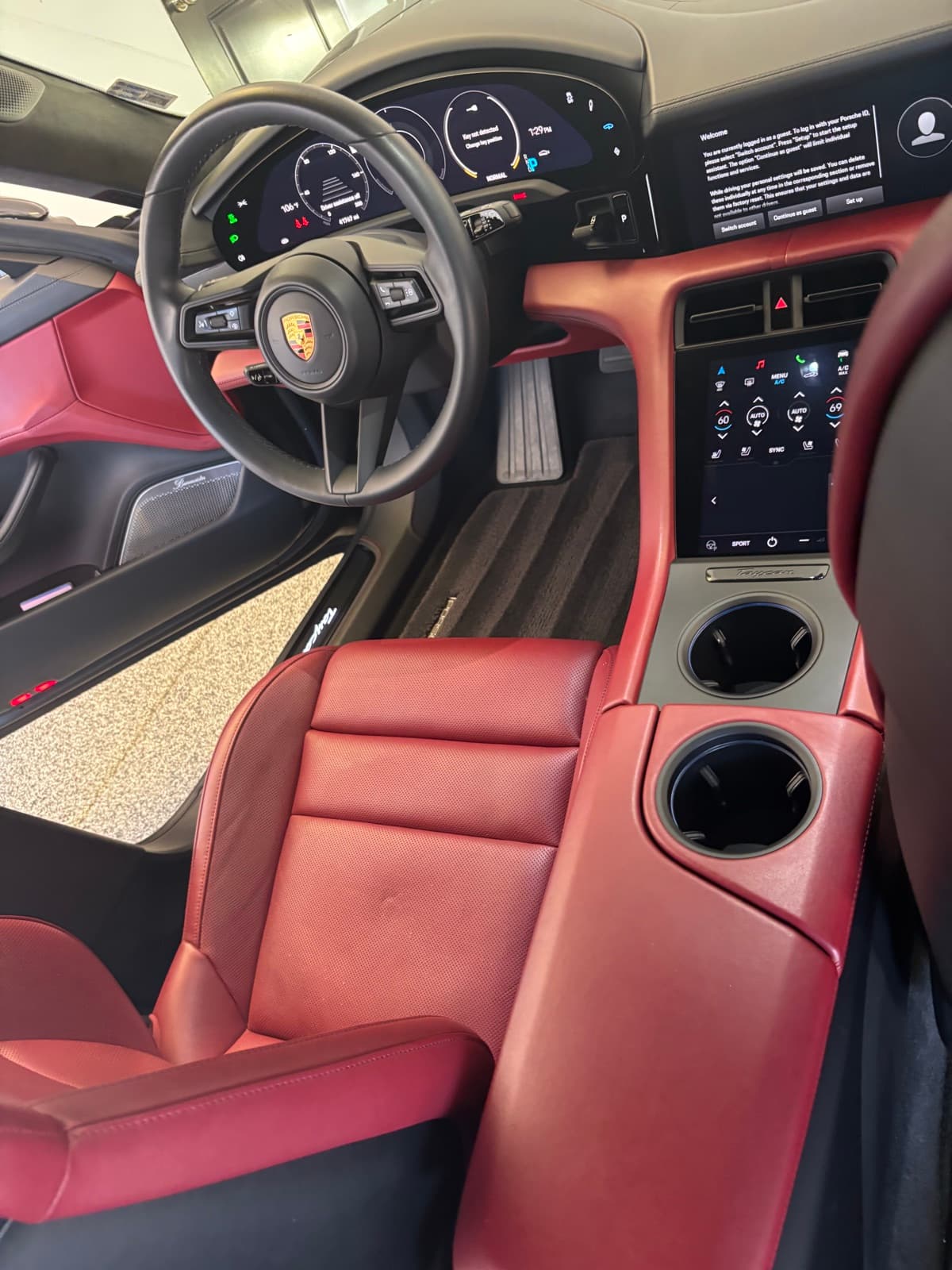 Porsche Taycan dashboard and center console after detailing